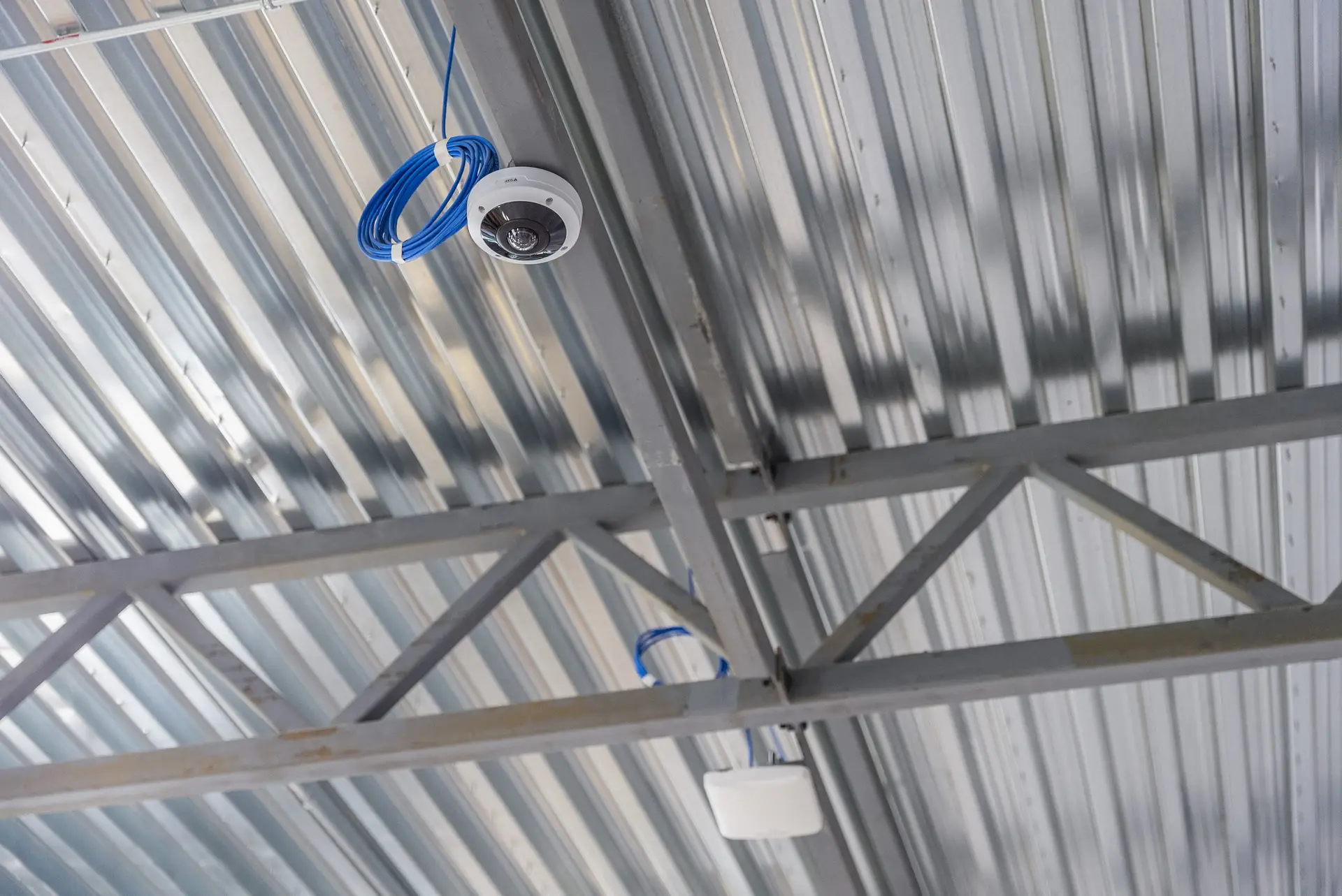 Networking and Infrastructure Solutions camera ceiling camera with blue cable