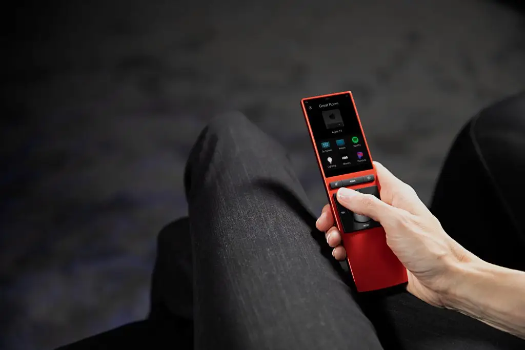 Handheld remote on a person's lap